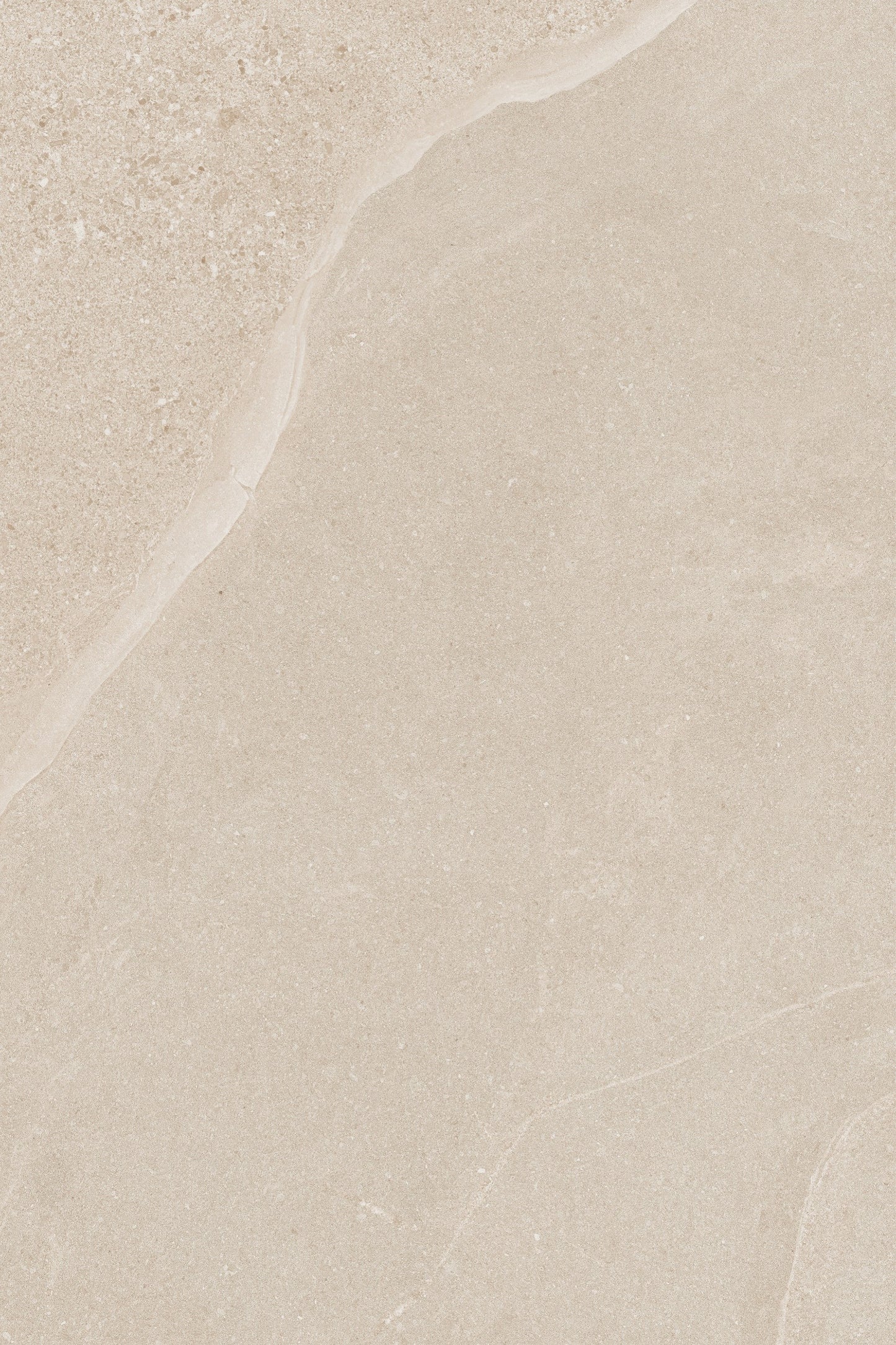A close-up of Ashmore Ivory Porcelain Paving Slabs showcases a beige surface with subtle variations in texture and color, featuring smooth areas and a slightly rough, natural pattern along the top edge.