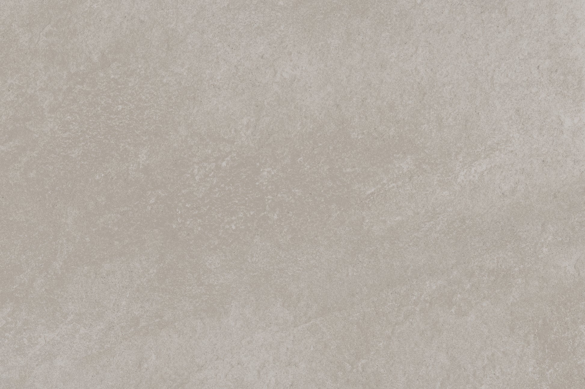 Light gray Antillies Grey Porcelain Paving Slabs feature subtle texture and soft, uneven patterns. These outdoor porcelain tiles offer a uniform, natural look typical of marble or concrete, with faint white and gray variations throughout.
