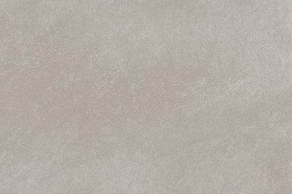 Light gray Antillies Grey Porcelain Paving Slabs feature subtle texture and soft, uneven patterns. These outdoor porcelain tiles offer a uniform, natural look typical of marble or concrete, with faint white and gray variations throughout.