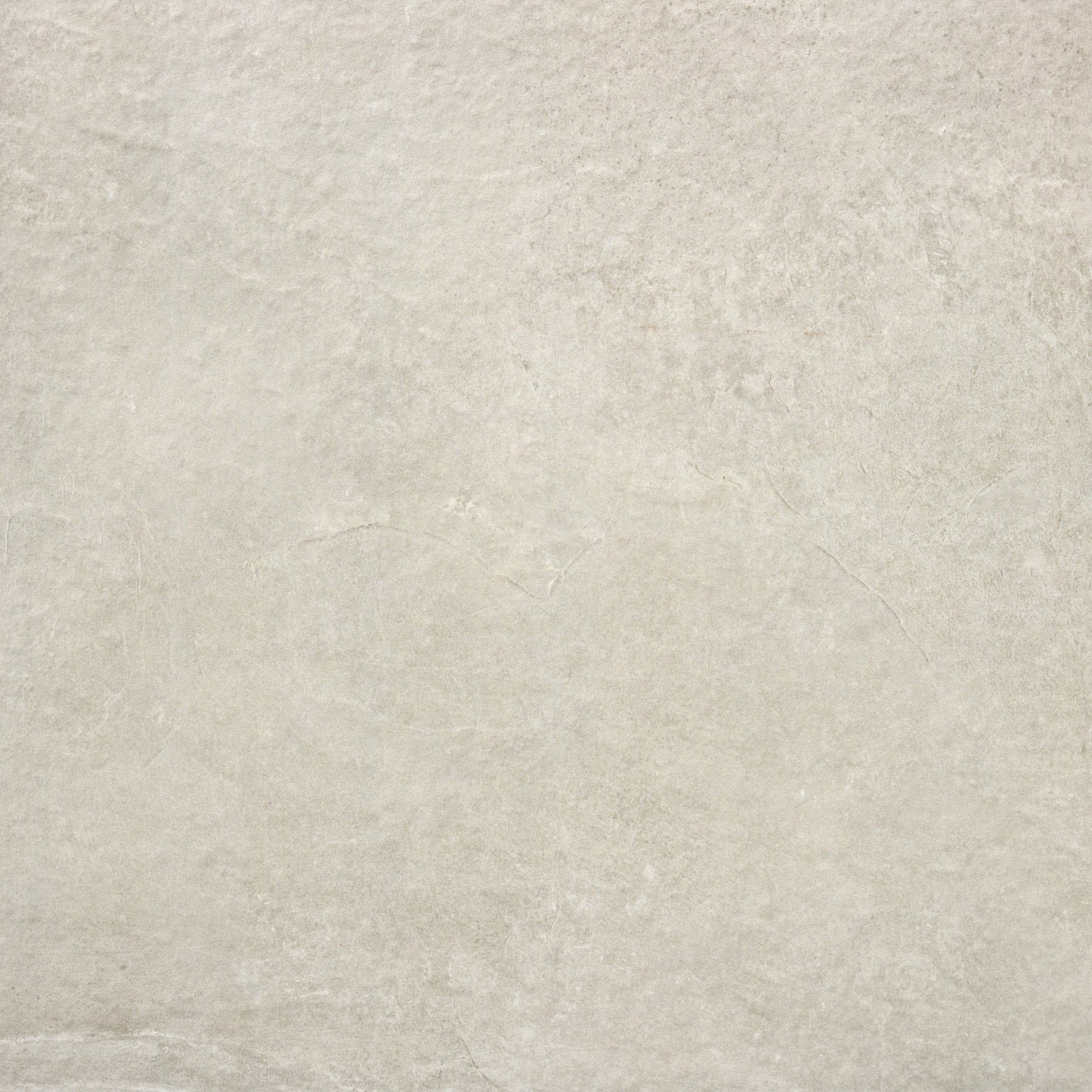 Light gray stone surface with subtle, natural texture and faint lines. The look is neutral and minimalistic, making it ideal for outdoor porcelain tiles like Palmer Bone Porcelain Paving Slabs, thanks to its smooth finish and gentle shading variations.