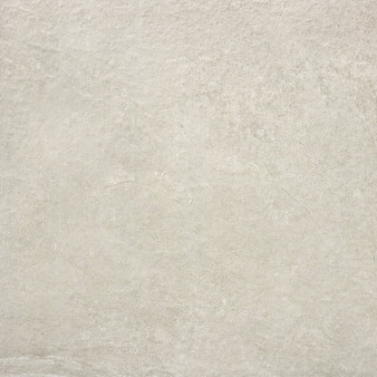 Light gray stone surface with subtle, natural texture and faint lines. The look is neutral and minimalistic, making it ideal for outdoor porcelain tiles like Palmer Bone Porcelain Paving Slabs, thanks to its smooth finish and gentle shading variations.